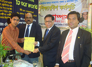 Advisor to the Former Caretaker Government, Mahbub Jamil, is giving Certificates to the trainees of Apprenticeship Program as Chief Guest; Next to him CEO of Partex Group, K.M Ali and Secretary-General of CSDC, Dr. M Helal. (2009)
